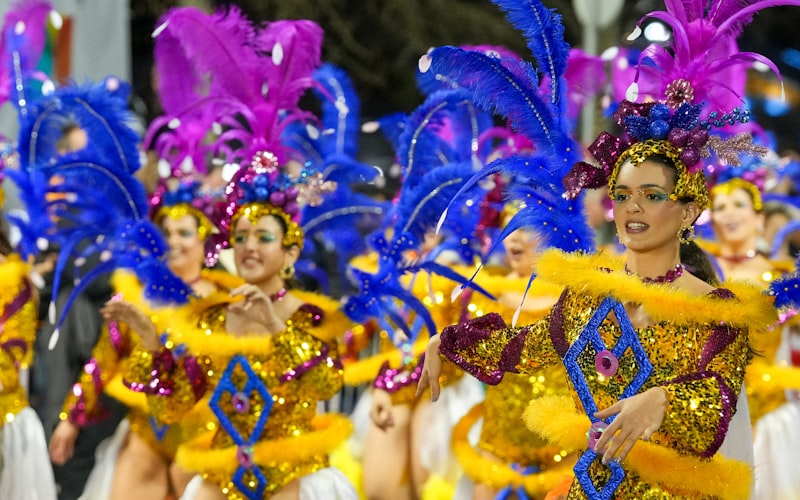 Carnival dancers in elaborate costumes performing in a parade in Rio de Janeiro