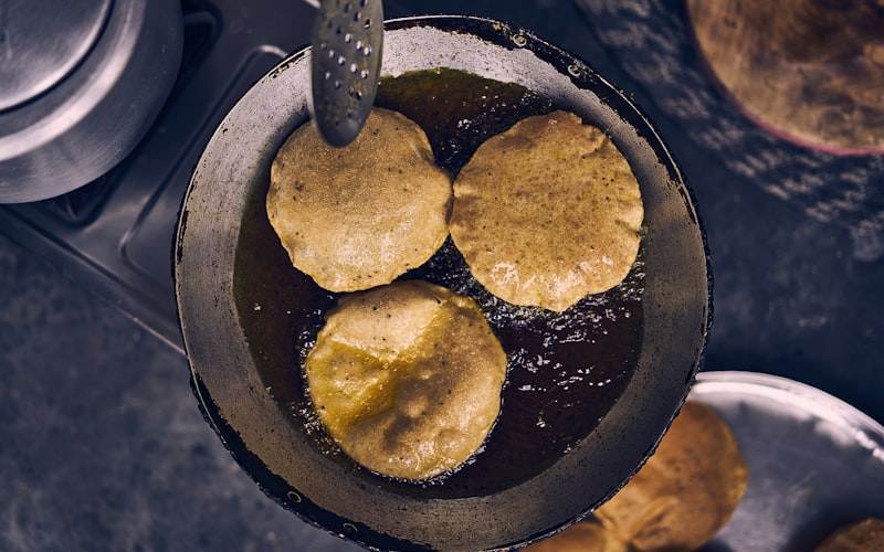 Colorful spread of Brazilian dishes on a rustic wooden table